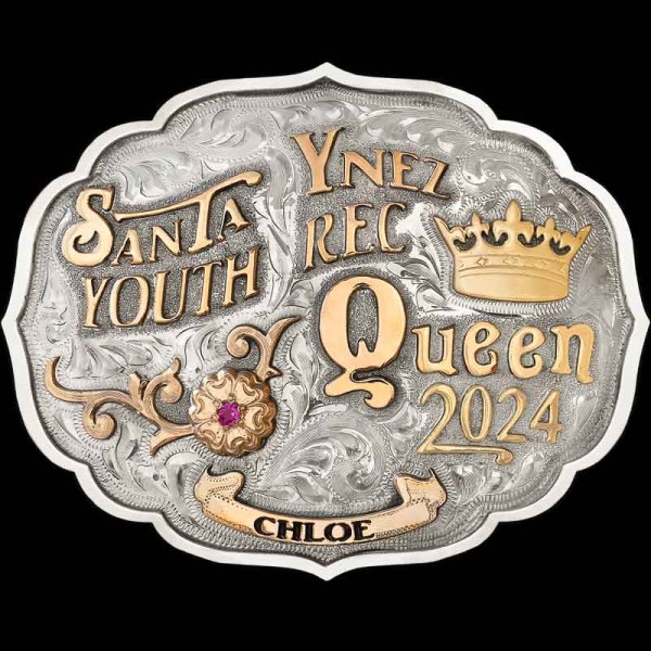 A Custom Buckle built as beautiful as the Teton Mountains in Wyoming. This buckle is hand engraved on a German Silver Base with a natural finish. Detailed with a solid edge, Jeweler's Bronze scrolls, flowers, and banner at the bottom. 